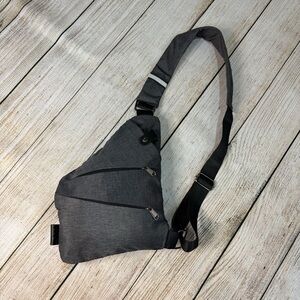 NWOT LPnd Unisex Anti Theft Waterproof Travel Sling Bag Crossbody